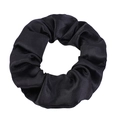 Detailed view of black satin scrunchie showing glossy fabric texture and elastic pleats - Black
