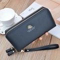 Elegant black lychee texture long double-zipper wallet with gold clover logo and wrist strap - Black