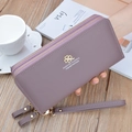 Long purple leather wallet for women with double zipper and lychee pattern - Purple
