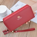 Red long double zipper wallet with litchi grain texture and gold clover logo - Wine Red
