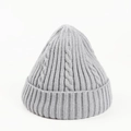 Detail view of light grey cable knit beanie with premium ribbed edge and warm wool texture - Gray