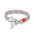 Close-up of rainbow braided paracord bracelet with a silver whale tail metal buckle - Colorful