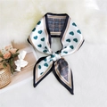 Elegant narrow white silk scarf with green hearts and plaid pattern tied in a bow - Heart Green