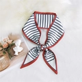Elegant black and white striped skinny scarf with red trim and letter M logo - Orange Stripe