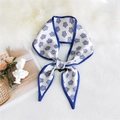 Silk-textured long scarf with purple floral print and navy border in knotted style - Five-petal Small Flower Blue