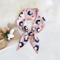 Pink heart and cartoon girl print narrow silk scarf styled on white faux fur - Girl Heart Pink