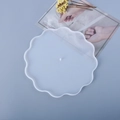 Close-up of a wavy edge silicone mold for crafting DIY 3-tier flower-shaped fruit trays - Mirror Flower 3-Tier Tray Mold (Large) / Translucent White