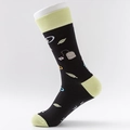 Mid-calf cotton socks in black and yellow with tea bag and tea leaf patterns - One Size / Black Yellow Tea Pattern
