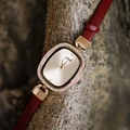 Elegant gold oval quartz watch with diamond bezel and classic red leather strap - Burgundy