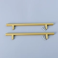Macro view of matte gold T-bar cabinet handles with four silver mounting screws - Gold Tray Handles - Large (1 Pair)