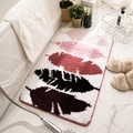 Plush non-slip floor mat featuring stylized feather patterns in pink and rose shades - 45*70cm / Flying Feathers-Red