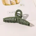Macro shot of large matte green hair claw clip with strong metal spring and teeth - 11cm Cross - Matte Army Green