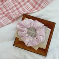 Pink daisy print organza scrunchie displayed on a vintage book page backdrop - Pink Small Floral