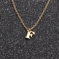 Minimalist gold stainless steel necklace featuring a polished letter F pendant on link chain - Gold F