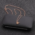 Minimalist rose gold stainless steel letter W pendant necklace on a black textured box - Rose Gold W