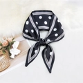 Black silk scarf with white polka dots and striped edges tied in a stylish bow - Big Polka Dot Black