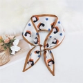 Chic heart and girl print silk twilly scarf in cream with contrast hem for handbags - Girl Heart Orange