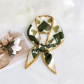 Elegant green silk neck scarf with heart patterns and yellow edges in a bow knot - Green Heart Pattern