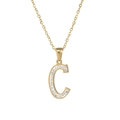 Detailed close-up of golden stainless steel letter C pendant with sparkling rhinestones - Letter C / Gold