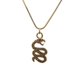 Close-up of golden snake pendant with micro-paved zircons and red gemstone eyes - 0192 Snake Style 12 Box Chain Gold