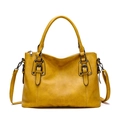 Elegant mustard yellow faux leather handbag with retro buckle straps and top handles - Yellow