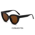 Cat eye sunglasses C5 featuring bold black frames and brown tea-colored lenses - Black Frame Tea Lens