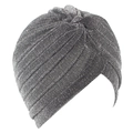 Detailed close-up of silver glitter fabric and top knot on a shimmering turban cap - One Size / Silver