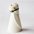 Foldable cream straw sun hat with black ribbon in a portable rolled-up storage shape - Creamy White