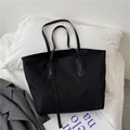 Minimalist black nylon tote bag with slender straps and sleek vertical leather trim - Without Pendant / Black