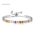 Adjustable silver tennis bracelet featuring colorful multi-gemstone zircon crystals - 4mm White Gold Round Rainbow Stone