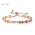 Rose gold adjustable tennis bracelet featuring colorful round-cut cubic zirconia crystals - 4mm Rose Gold Round Rainbow Stone
