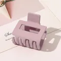 Macro detail of lavender matte square hollow hair claw clip showing textured finish - Small Rectangular - Matte Korean Pink