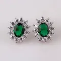 Green oval-cut gemstone earrings with sparkling white cubic zirconia halo in silver finish - Stud Earrings / Green