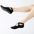 Calze da yoga antiscivolo nere con elastici incrociati e dettagli in silicone grip - Taglia unica / Nero