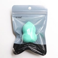 Single light green teardrop makeup sponge in professional resealable packaging - Green Gourd In Bag