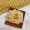 Yellow floral organza scrunchie with daisy patterns on a cozy aesthetic background - Yellow Small Floral