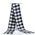 Classic black and white checkered scarf with elegant fringes displayed on a metal T-stand - Black White 9 Grids