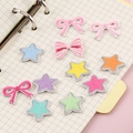 Colorful set of 12 embroidered patches featuring butterfly bows and stars for clothing - Multicolor