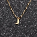 Detail view of a gold-plated stainless steel Cuban chain with a capital J letter pendant - Gold J