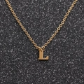 Detailed close-up of golden stainless steel chain necklace with letter L pendant - Gold L