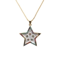 Close-up of star pendant necklace with colorful gems and white enamel on gold chain - Star 1 White Enamel Box Chain