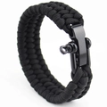 Detail of black paracord survival bracelet featuring a heavy-duty black metal shackle clasp - Black