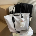 White nylon tote bag with black leather straps and a cute plush lamb pendant - With Lamb / White