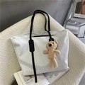 Minimalist white nylon tote bag with black wide straps and a brown teddy bear charm - With Bear / White
