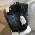 Black nylon tote bag with a cute white plush lamb charm and secure zipper closure - With Lamb / Black