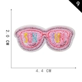 Pink sunglasses embroidery patch with SUN FUN text in 4.4cm by 2.0cm dimensions - Pink Sunglasses