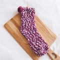 Thick coral fleece mid-tube cake sock in purple-red mix with plush ball decoration - One Size / Purple