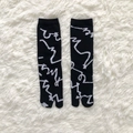Japanese tabi split toe socks in black with white abstract patterns on fluffy background - 35-41 / Black With Irregular Thick Stripes