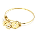 Golden stainless steel shell bangle with pearl and letter E charm on white background - Letter E / Gold