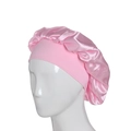 Pink satin sleep bonnet with wide elastic band on mannequin head, studio lighting - One Size / Pink
